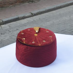 Mold Turban Cap with Holes and Tassels Maroon